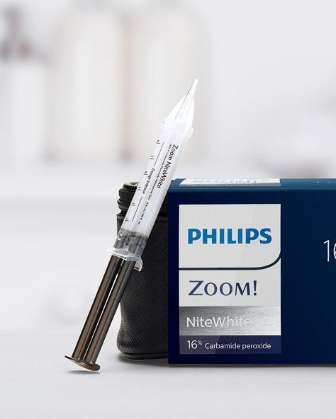 Single syringe of Philips Zoom NiteWhite 16% carbamide peroxide for home teeth whitening.